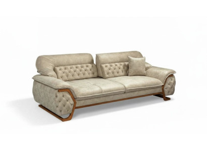 Canapé luxueux Chesterfield à trois places avec dossier réglable.