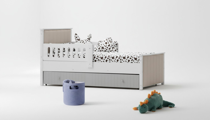 Lit d'enfant pratique de couleur grise pour de douces heures de sommeil. Luxueux