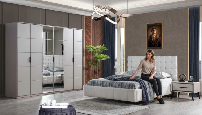 Ensemble de chambre blanc en tissu rembourré de luxe, lit en bois, armoire.