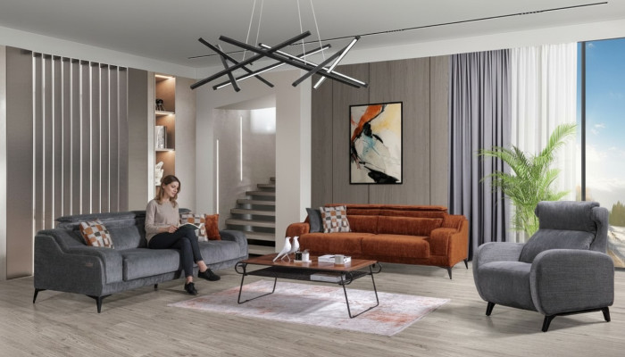 Mobilier de salon gris-orange exclusif avec canapé 3 places de luxe et fauteuil individuel.
