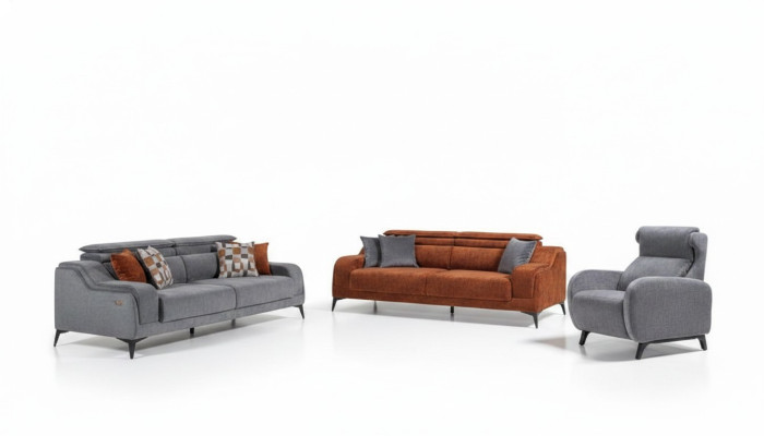 Mobilier de salon gris-orange exclusif avec canapé 3 places de luxe et fauteuil individuel.