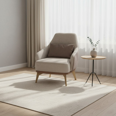 Fauteuil exclusif de salon en tissu pour une personne, design moderne avec pieds en bois élégants.