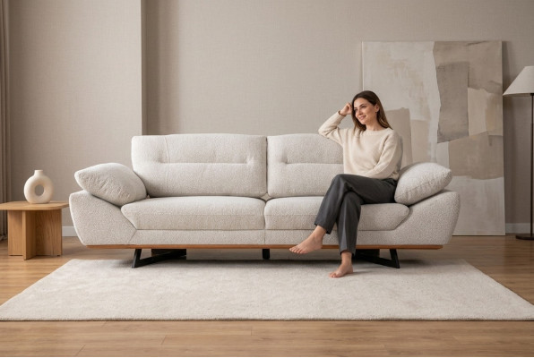 Canapé design confortable 3 places en tissu blanc dans le salon