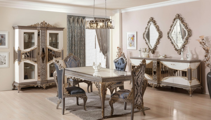 Suite de salle à manger de luxe blanche. Mobilier de salle à manger comprenant table, chaises et miroir.