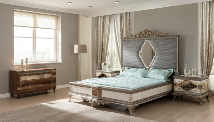 Chambre de luxe classique en gris avec lit double et 2 tables de chevet.