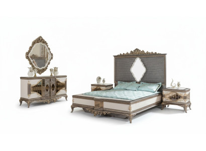 Chambre de luxe classique en gris avec lit double et 2 tables de chevet.