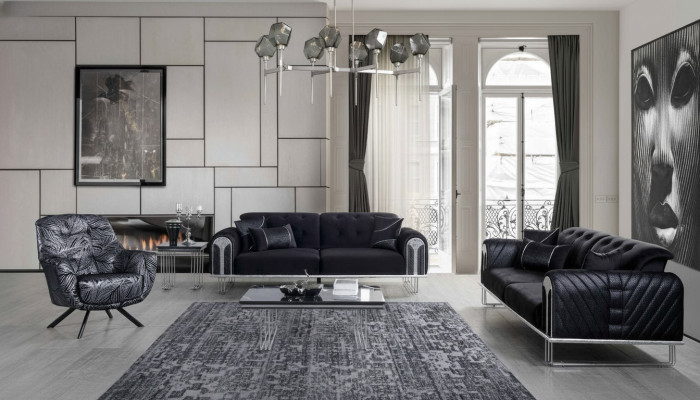 Ensemble de sièges pour salon noir-gris composé d'un canapé 3 places et de deux fauteuils.