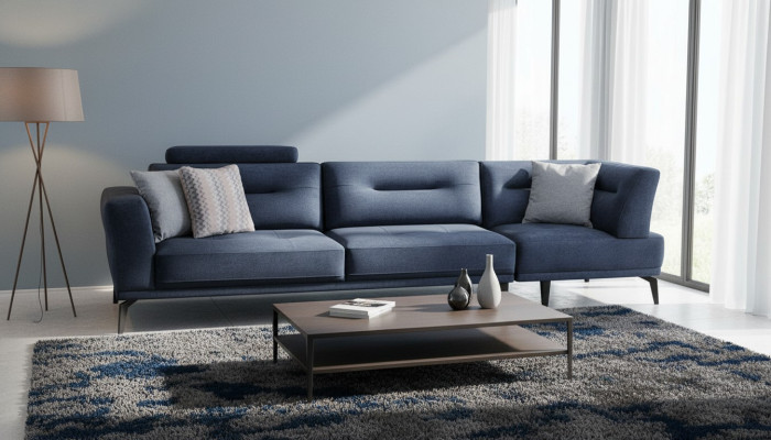 Canapé luxueux à quatre places en tissu bleu pour le salon, design moderne.