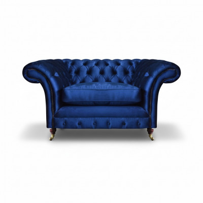 Fauteuil bleu moderne Chesterfield meuble de luxe pour salon.
