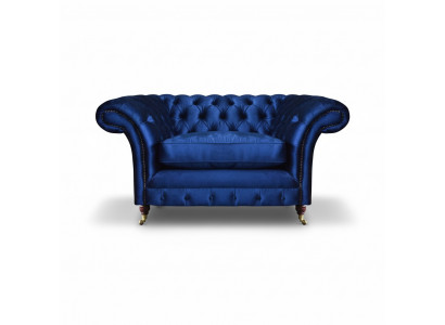 Fauteuil bleu moderne Chesterfield meuble de luxe pour salon.
