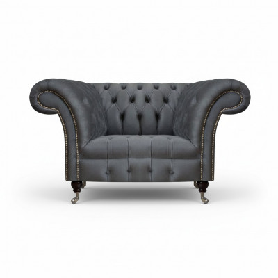 Fauteuil Chesterfield moderne gris pour salon design fauteuil inclinable élégant.