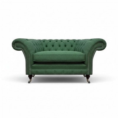Fauteuil Chesterfield vert élégant en textile pour salon, noble fauteuil une place.