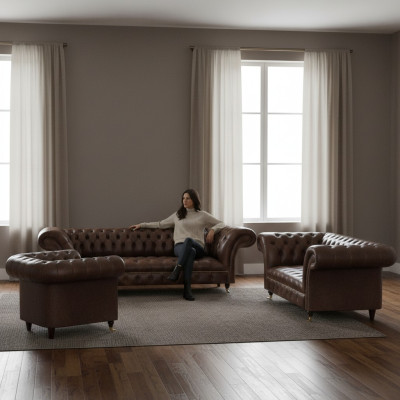 Salon Chesterfield en cuir marron 4 places canapé deux places fauteuil.