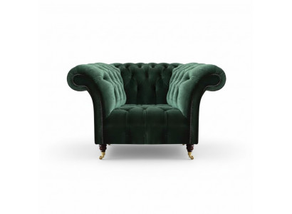 Fauteuil Chesterfield vert émeraude en tissu pour le salon.