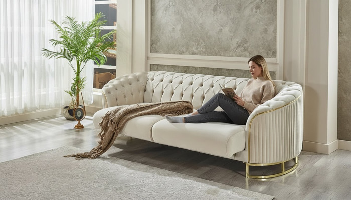Canapé Chesterfield blanc trois places pour salon