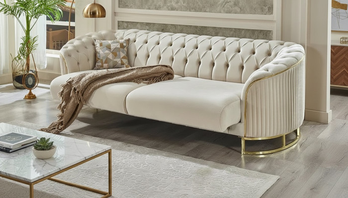 Canapé Chesterfield blanc trois places pour salon
