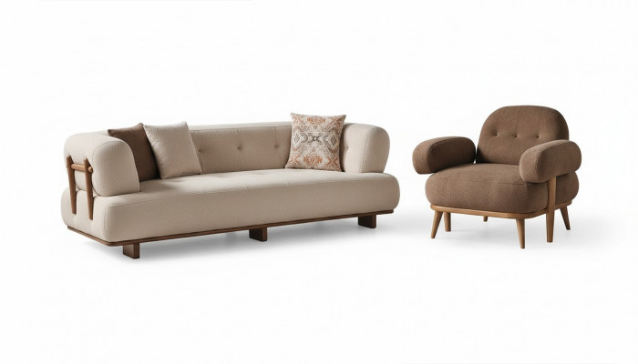 Salon exclusif en beige avec canapé, sofa et fauteuils.