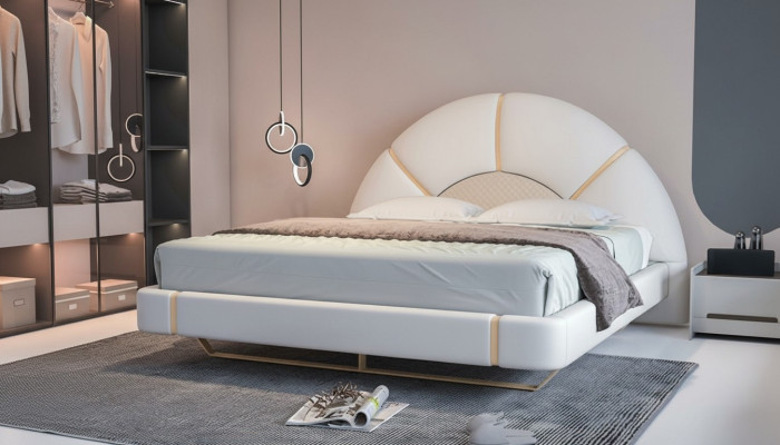 Lit luxueux au design moderne avec des détails dorés, tête de lit en forme de demi-lune