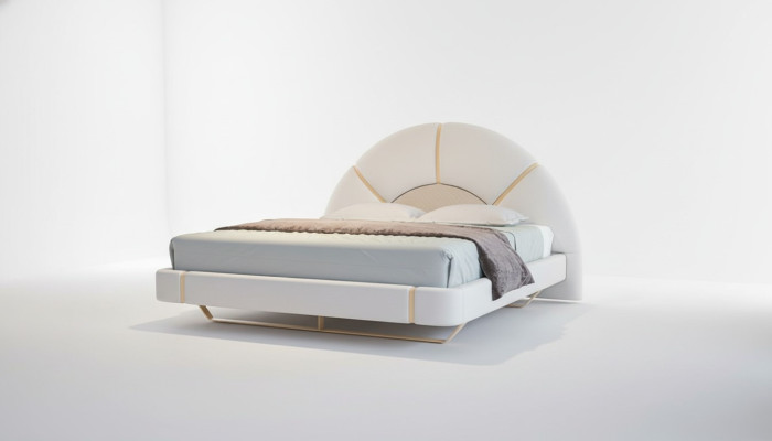 Lit luxueux au design moderne avec des détails dorés, tête de lit en forme de demi-lune