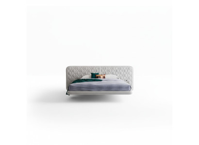 Lit rembourré blanc moderne avec un design minimaliste et arrondi