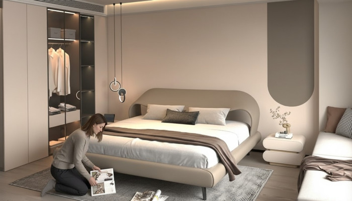 Lit gris élégant avec un design minimaliste et arrondi
