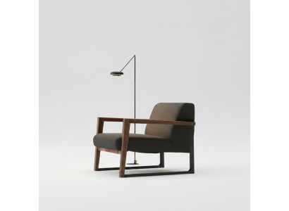 Fauteuil moderne rembourré pour une pièce confortable