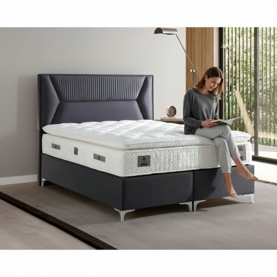 Lit élégant gris avec matelas en textile et en bois