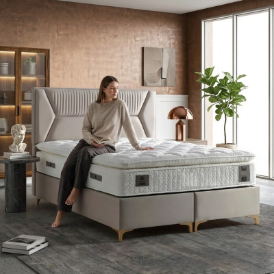 Lit élégant beige avec matelas en textile et en bois
