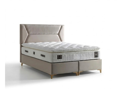 Lit élégant beige avec matelas en textile et en bois