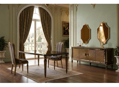 Elegantes Esszimmer Dunkler Tisch Goldene Akzente Stühle Sideboard