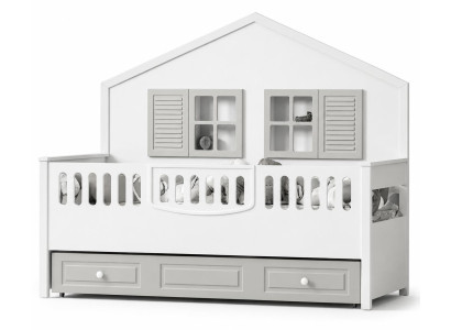 Kinderbett im Haus-Stil mit Schubladen und liebevollen Details in Weiß