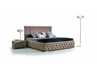 Un luxueux lit Chesterfield dans un style contemporain élégant.