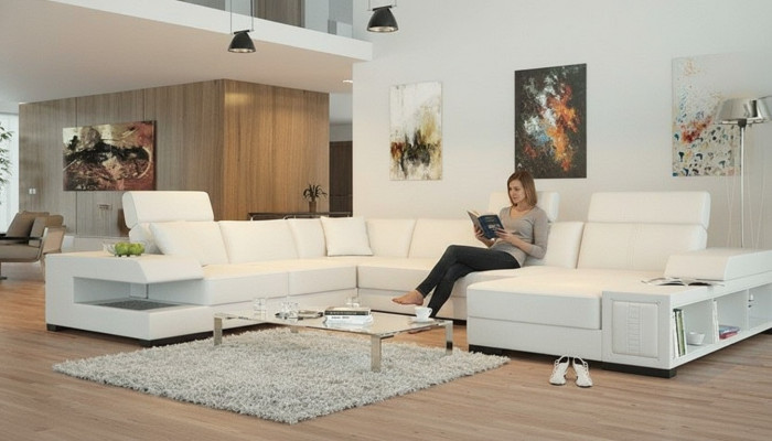 Canapé d'angle design blanc comme neige en forme de U pour une ambiance de vie luxueuse