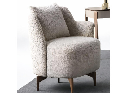 Eleganter Designer Sessel in Beige mit Bouclé Stoff und Holzbeinen