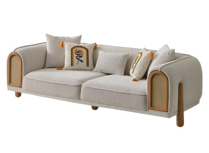 Beiges stilvolle Sofa mit Rattan-Details und bunten Kissen Hochwertig Möbel